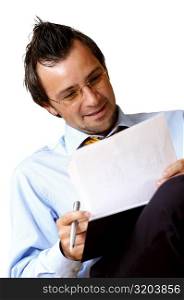 Businessman reading documents