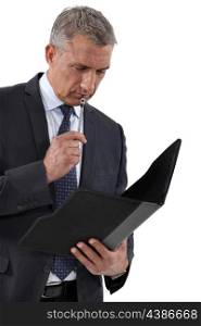 businessman reading documents