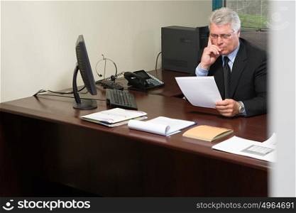 Businessman reading resume