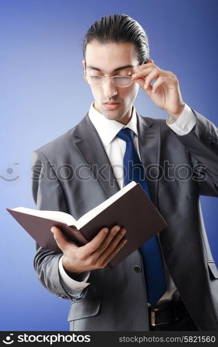 Businessman reading the book