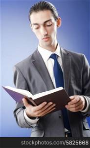 Businessman reading the book