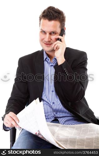 businessman reads newspaper phoning talking on mobile phone commenting economy news isolated on white background