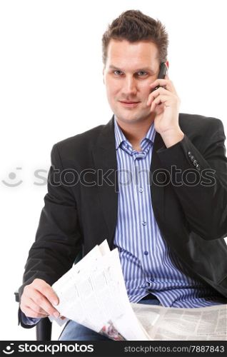 businessman reads newspaper phoning talking on mobile phone commenting economy news isolated on white background