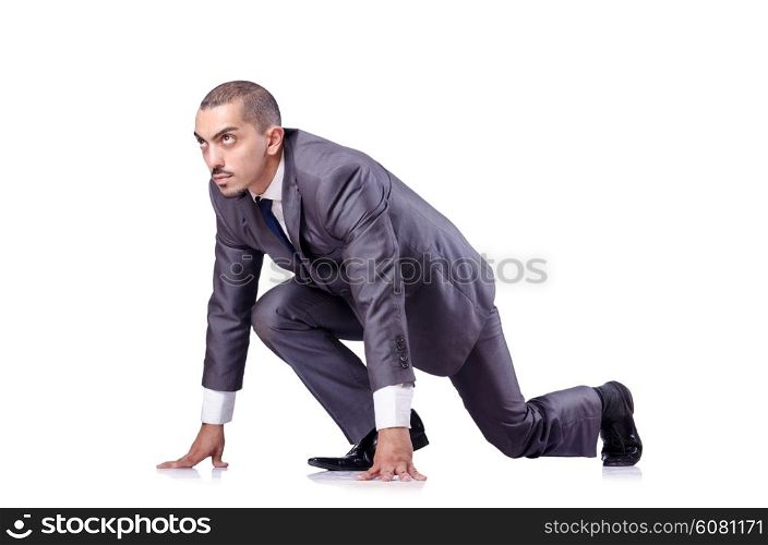 Businessman ready for race isolated on white