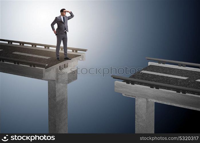 Businessman ready to overcome the broken bridge
