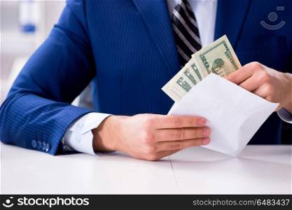 Businessman receiving his salary and bonus