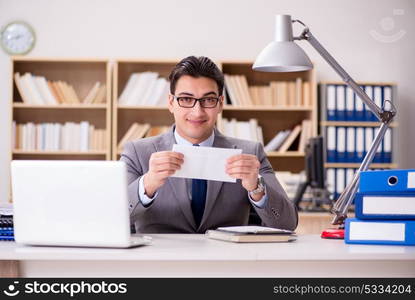 Businessman receiving letter in the office