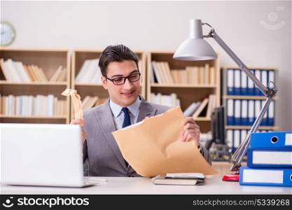 Businessman receiving letter in the office