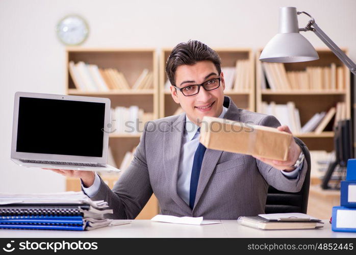 Businessman receiving parcel in the office