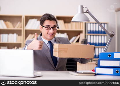 Businessman receiving parcel in the office