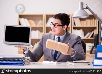 Businessman receiving parcel in the office