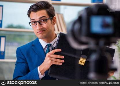 Businessman recording a video for vlog