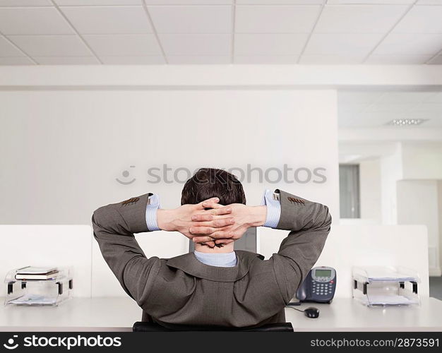 Businessman Relaxing at Desk