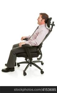Businessman relaxing in a comfortable ergonomic office chair. Full body isolated on white.