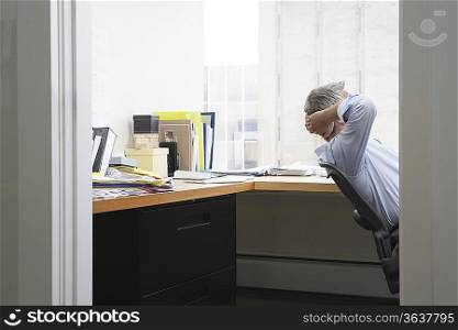 Businessman Relaxing in Office