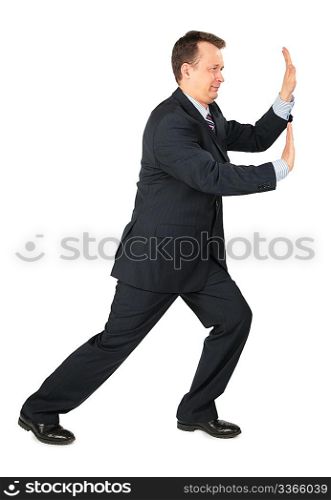 businessman rests hands against wall, push somthing