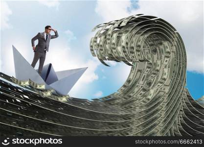 Businessman riding paper boat in dollar sea