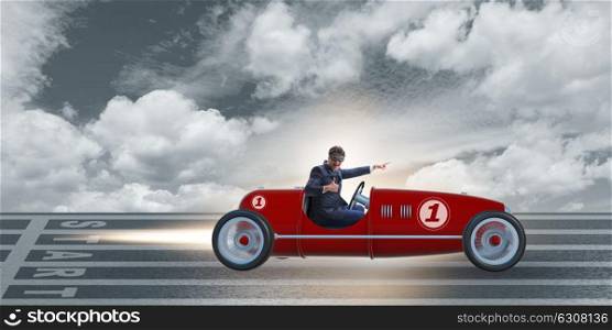 Businessman riding vintage roadster in motivation concept