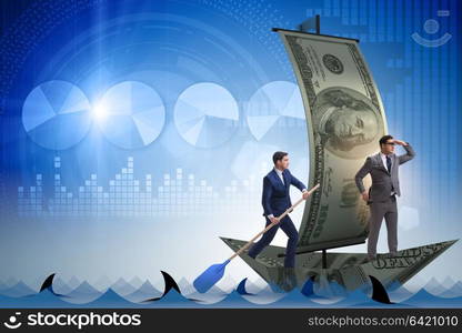 Businessman rowing on dollar boat in business financial concept