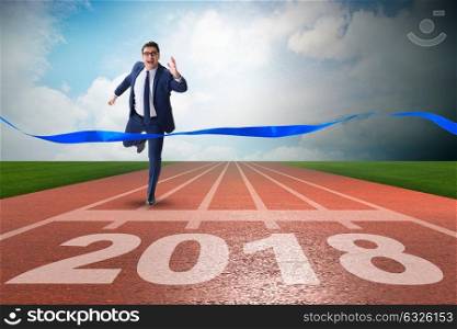 Businessman running towards new year 2018. Businessman running towards new year 2018