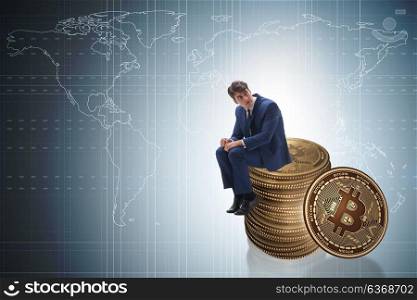 Businessman sad about bitcoin price crash
