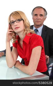 Businessman sat with intern