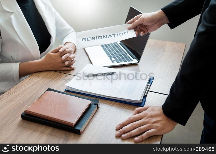 Businessman sending resignation letter to employer boss Including about resignation from positions and vacancies, changing and resigning from work concept for quit or change of job leaving the office, unemployment.
