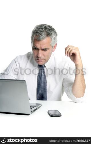 businessman senior gray hair working laptop computer white desk background