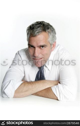 businessman senior seductive mouth gesture sit on white desk
