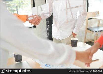 businessman shaking hands after meeting. Business people handshaking. Greeting deal, teamwork partnership concept.