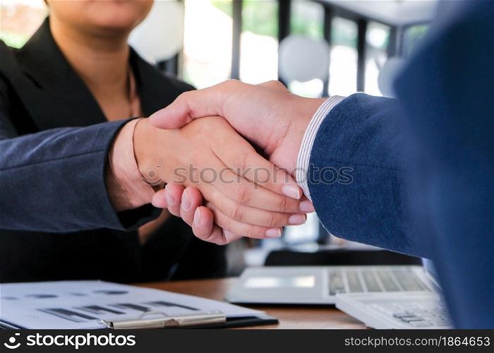 Businessman shaking hands successful candidate at interview. got the job in the team. Welcome aboard successful making a deal.partnership meeting