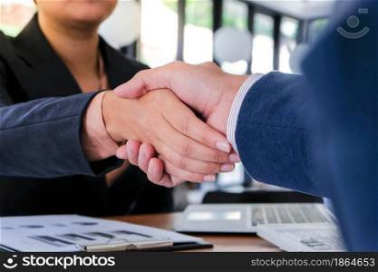 Businessman shaking hands successful candidate at interview. got the job in the team. Welcome aboard successful making a deal.partnership meeting