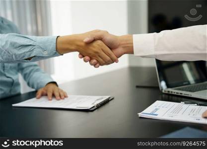Businessman shaking hands successful candidate at interview. got the job in the team. Welcome aboard successful making a deal. partnership meeting 