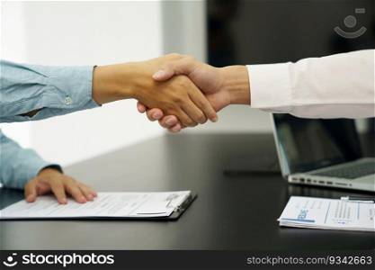 Businessman shaking hands successful candidate at interview. got the job in the team. Welcome aboard successful making a deal. partnership meeting 