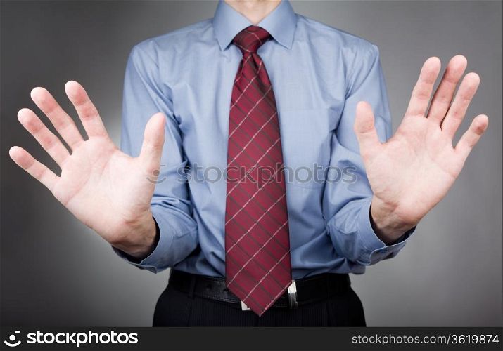 Businessman shaking his hands
