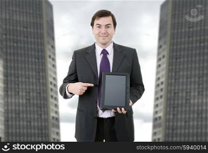 businessman showing a tablet pc at the office