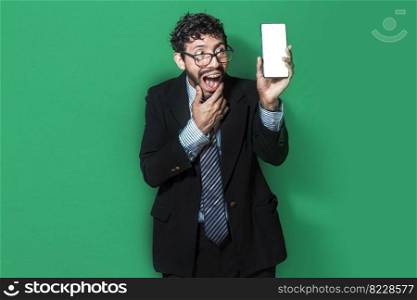 Businessman showing an advertisement on the screen of his cell phone. Amazed handsome business man showing cell phone screen, Surprised young businessman showing cell phone screen