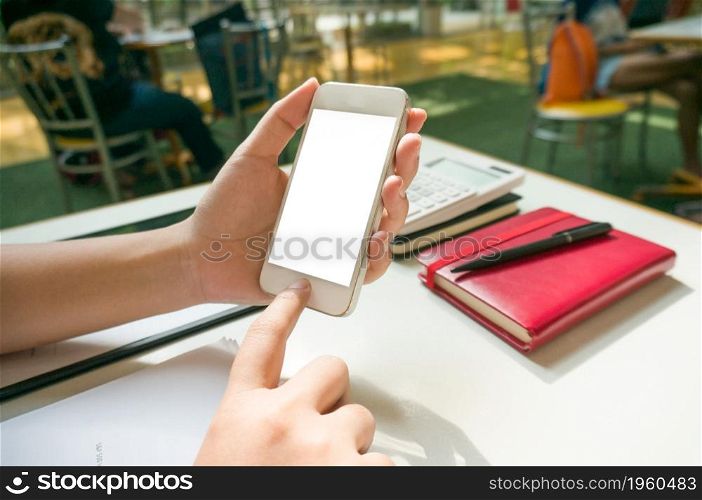 Businessman showing blank business card and holding smart phone.Business man holding white blank card space for text. product display montage.
