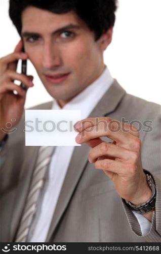 Businessman showing business card
