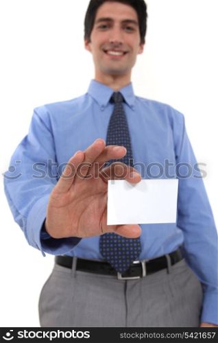Businessman showing his business card.