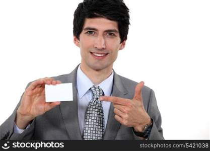 Businessman showing his card.