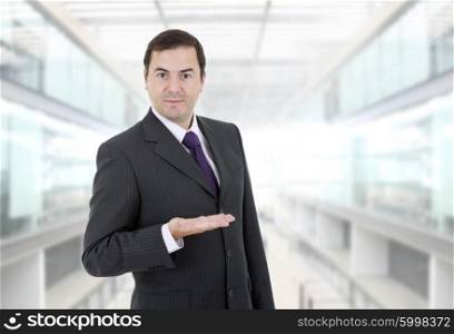 businessman showing is hand at the office