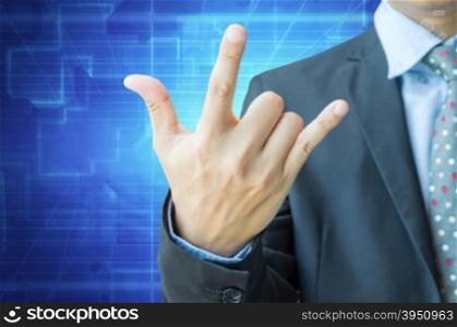 Businessman showing love sign by hand with clipping path, for love, romance or happiness concept&#xA;