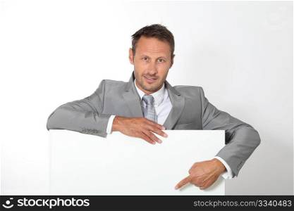 Businessman showing message board