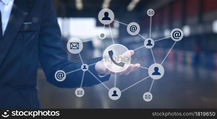 Businessman shows outstretched hand with social icon on virtual screen. CONTACT US (Customer Support Hotline people connect ).