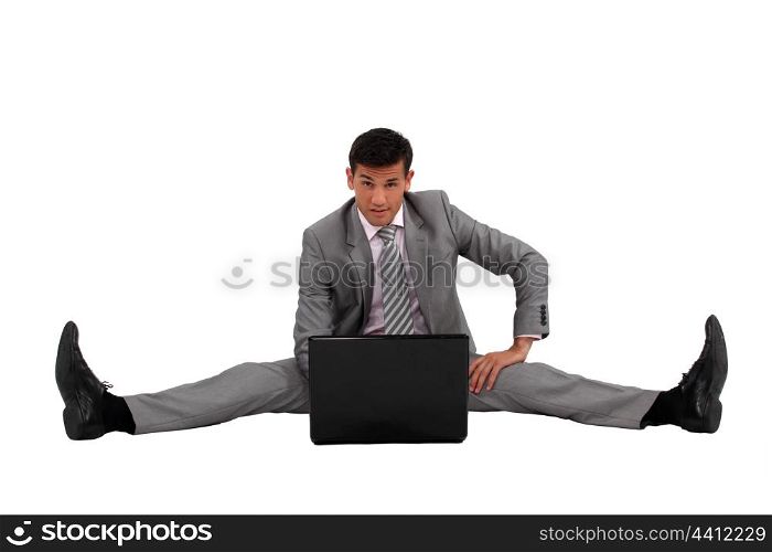 businessman side splitting on the floor