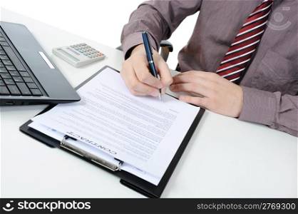 Businessman signs contract. Isolated on white background