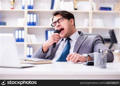 Businessman singing in the office