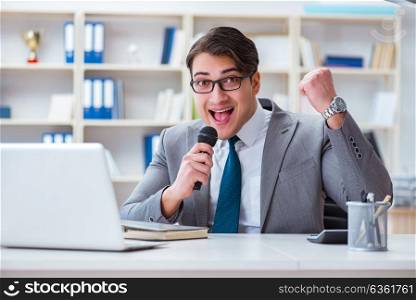 Businessman singing in the office