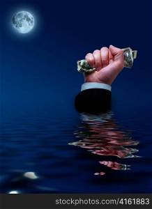 Businessman sinks with cash in his hands